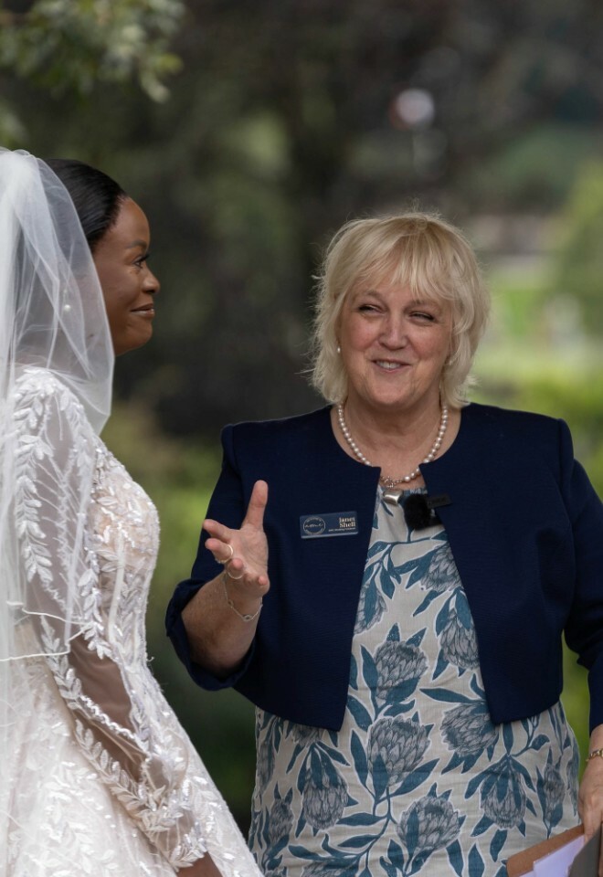 celebrant smilingly asks bride question