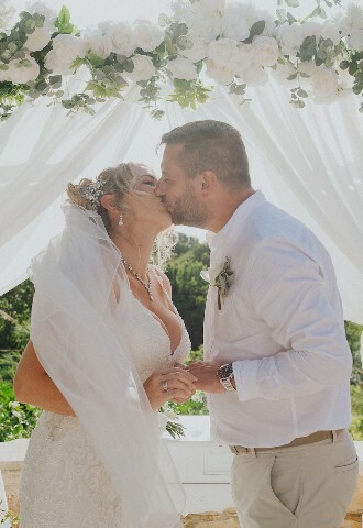 bride and groom sharing a kiss close up, exclusive yacht weddings in cyprus