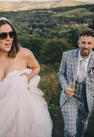 Wedding couple photo with landscape at The Stables Wedding Farm