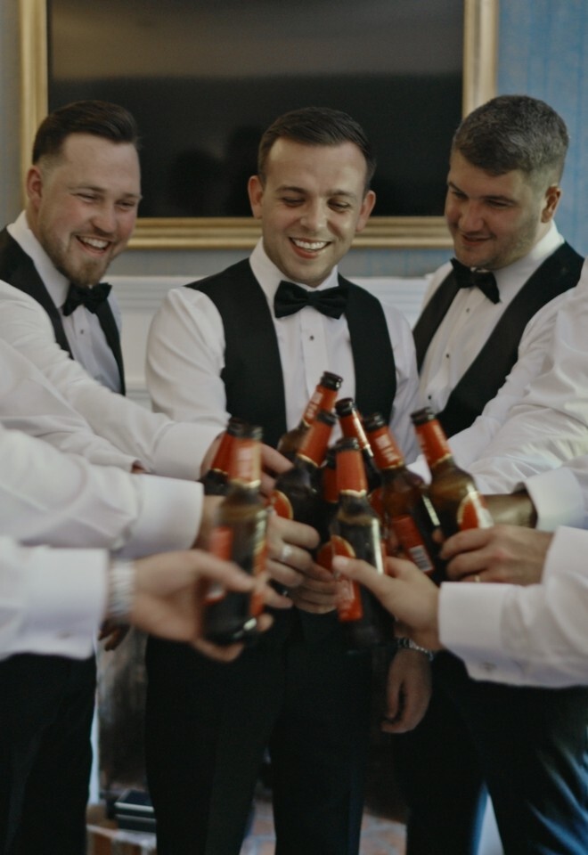 Groomsman having a beer