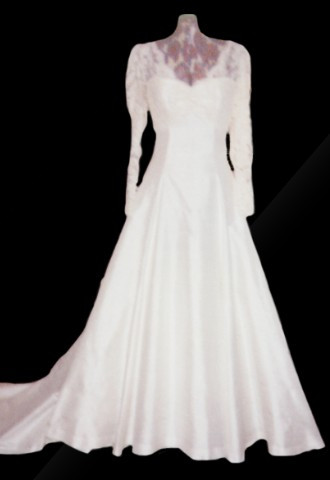Ivory silk dupion wedding dress with lace bodice embellished with pearl type beads