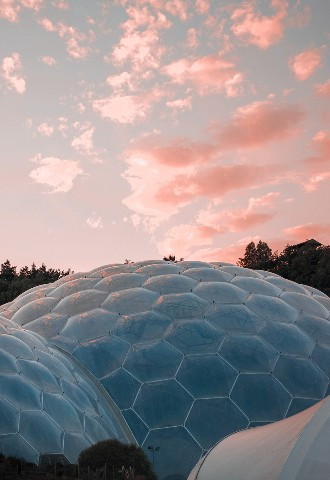 Sunset behind The Eden Project wedding venue in Cornwall