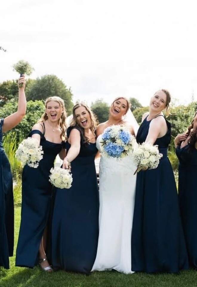 Katie and all her fabulous bridesmaids at Fennes Wedding venue, Essex