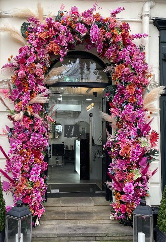 Wow factor floral entrance for Mark Blake Hair in Cirencester