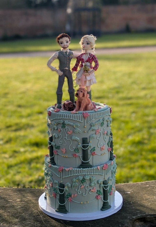 Green cake with chocolate figuring topper