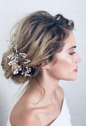 Rustic bridal updo and soft glow makeup