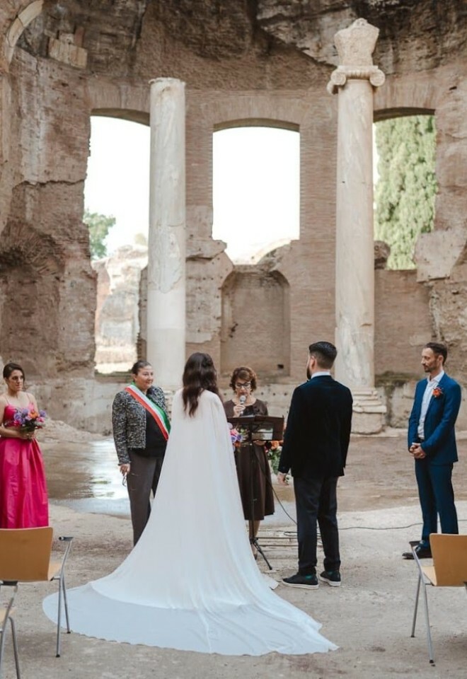 Legal wedding in ancient Roman ruins for AU and UK couple