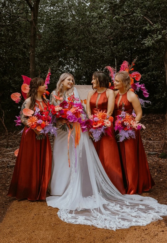 Bride and bridesmaids in woodland