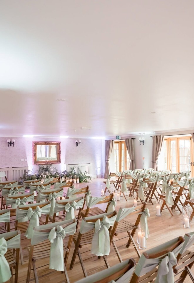 Indoor wedding ceremony at Tottington Manor