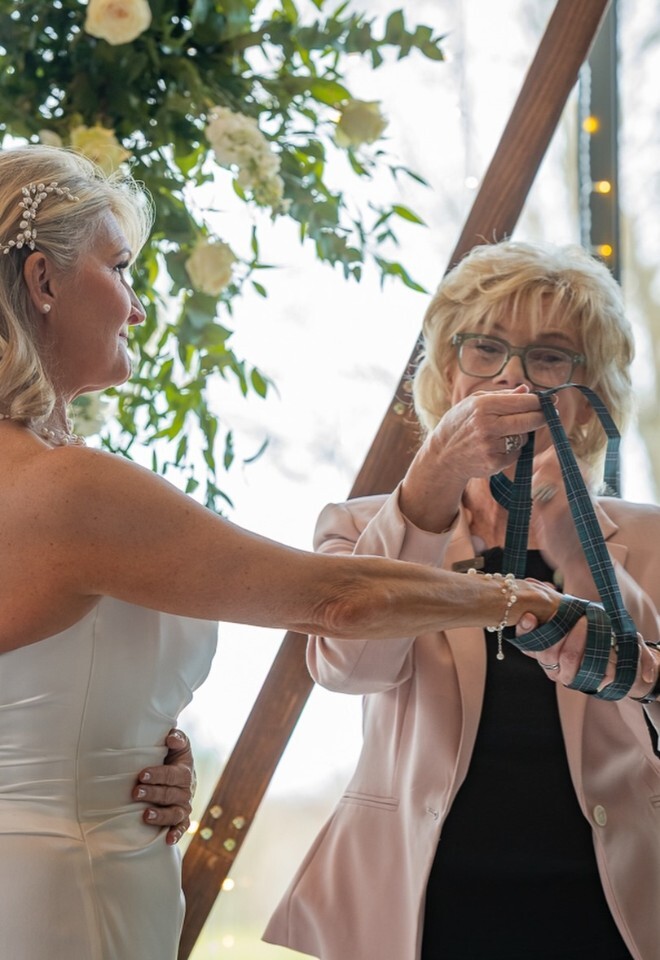 Scottish wedding, tying of hands between the bride & groom with wedding celebrant in Aberdeen