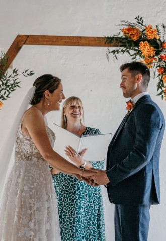 Celebrant Lisa with bride and groom at Launcells Barton