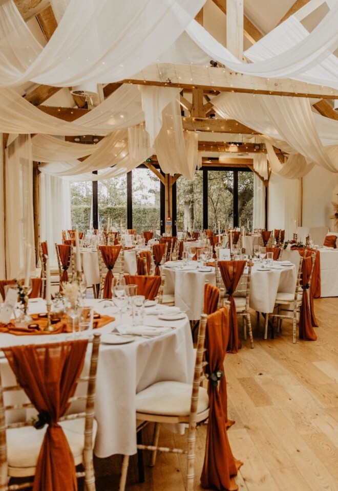 Main events space set for an autumnal wedding breakfast