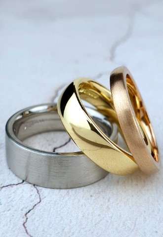 plain wedding bands in different golds