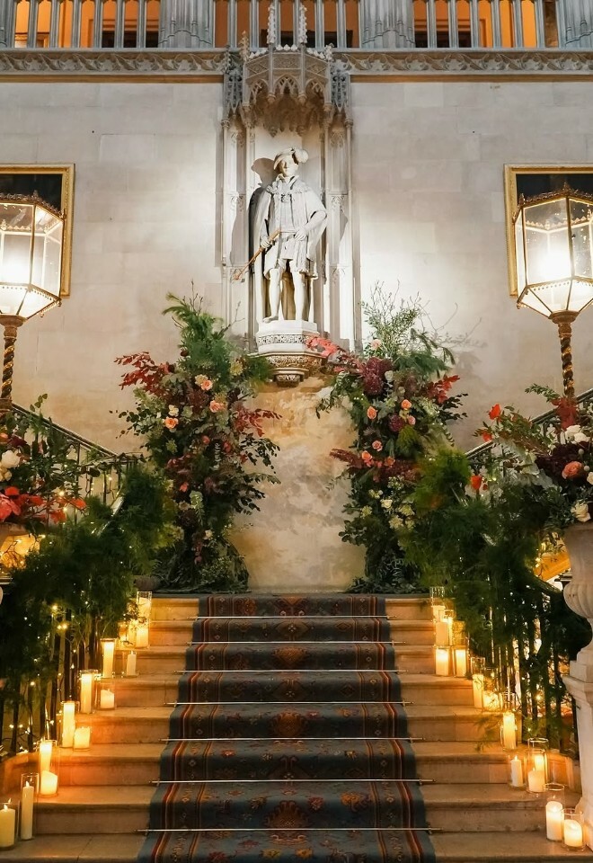 Decorated staircase at Ashridghe House with wedding Flowers form Hanako Flowers