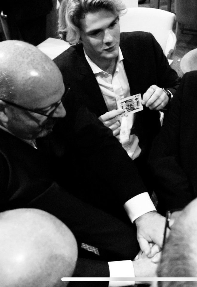 Nicky George performing magic at a wedding