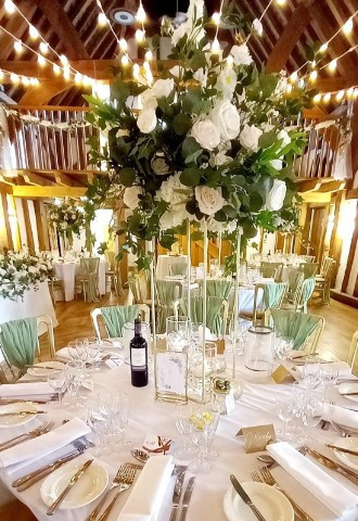 Hire Heaven floral centre pieces chair sash hire Buckinghamshire