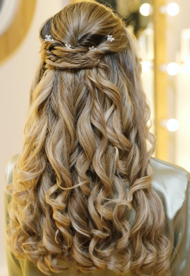 Curled half up half down hairstyle 