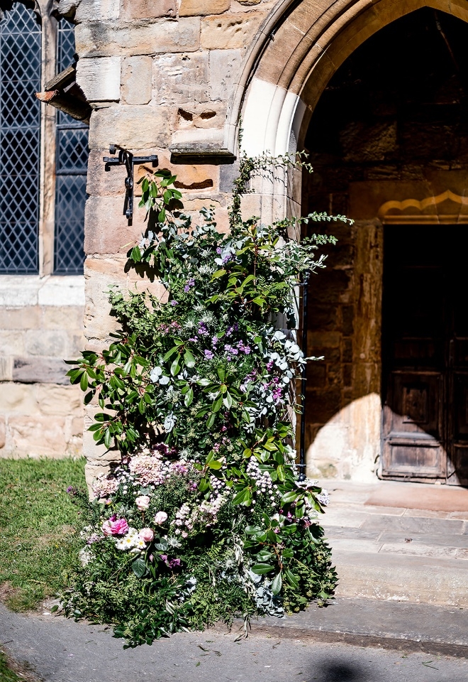A beautiful floral and foliage column at church