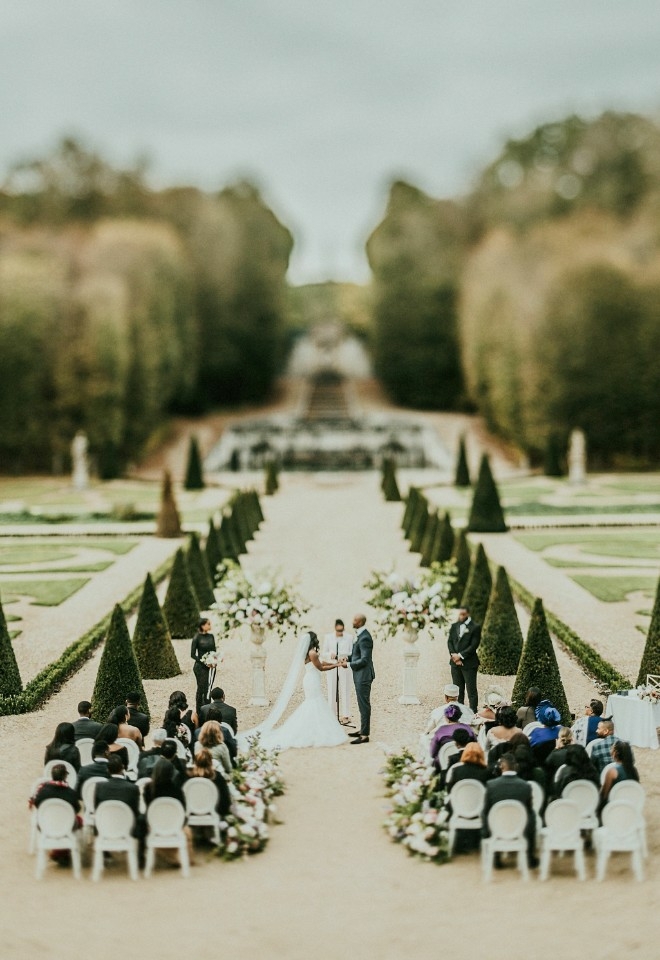 Jennifer Patrice, an experienced Independent Celebrant, with a happy couple on their wedding day, delivering an authentic, joyful, and personalised ceremony in a beautiful setting.