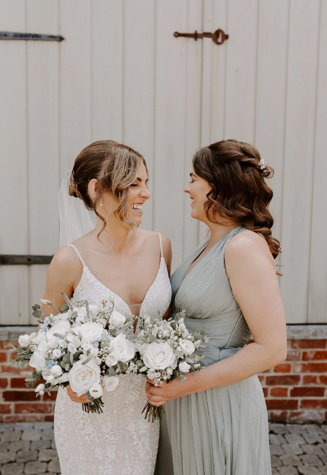 Bride and bridesmaid at Retreat East Wedding Venue