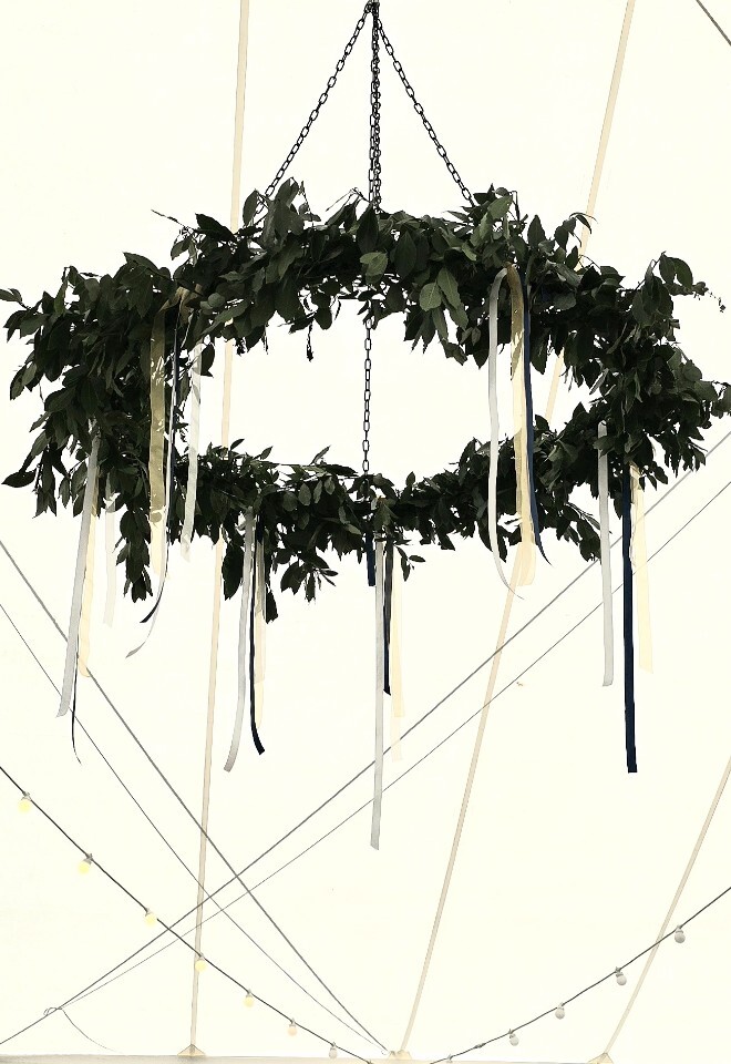 Luxury foliage chandelier installation by FLOWERS BY ANYA for a wedding in Somerset