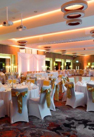 Beautiful Golden Wedding Setup with golden sashes