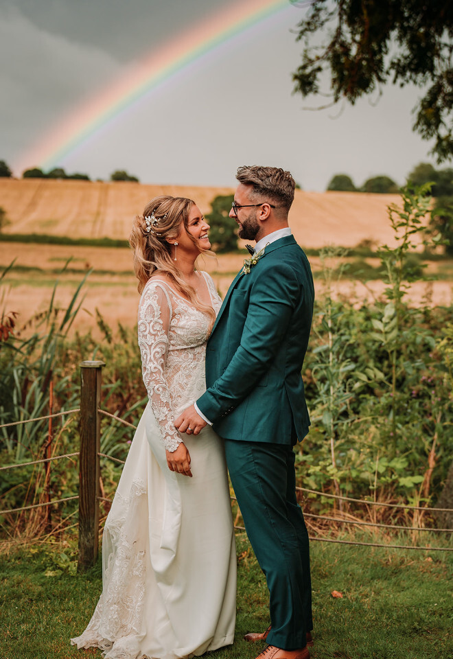 Rainbow over couple