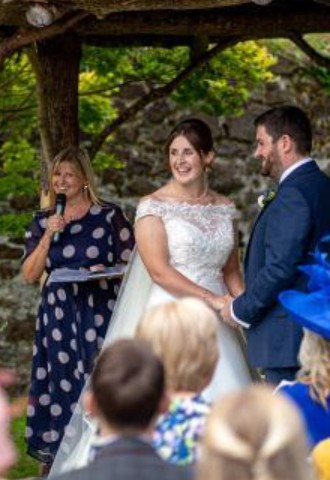 Celebrant Lisa with bride and groom at The Great Barn, Devon