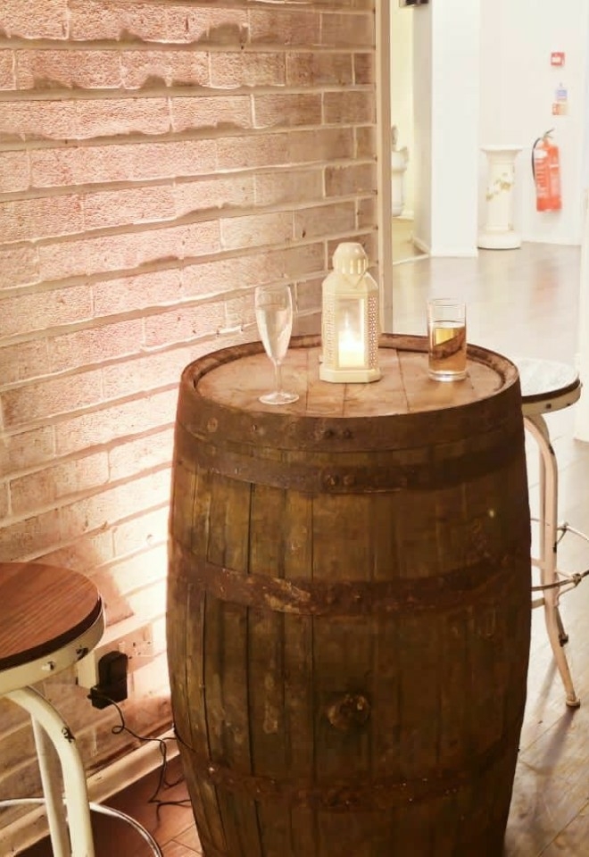 Whiskey Barrel and uplighters