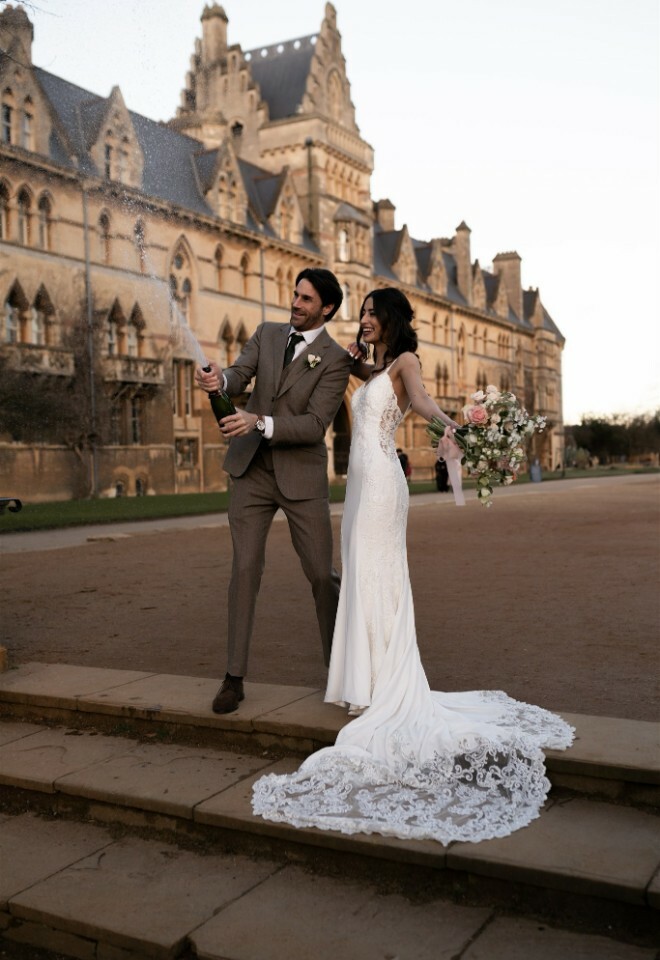 Oxford couple champagne spray