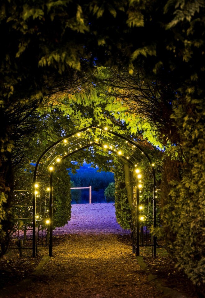 The garden and lights at a Northamptonshire country wedding venue 