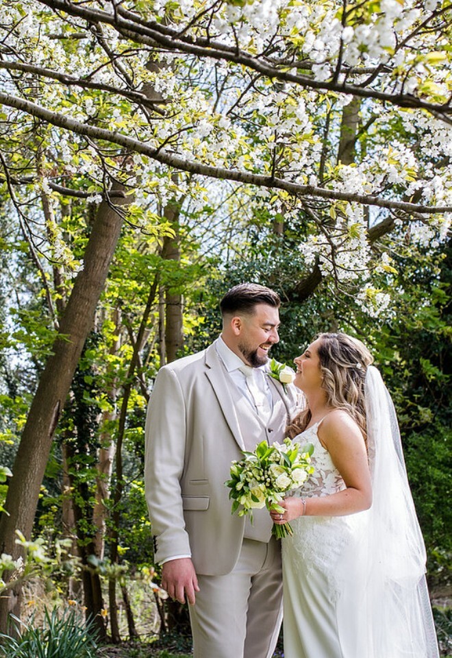 Blossom flowers and trees outdoor area wedding venue 