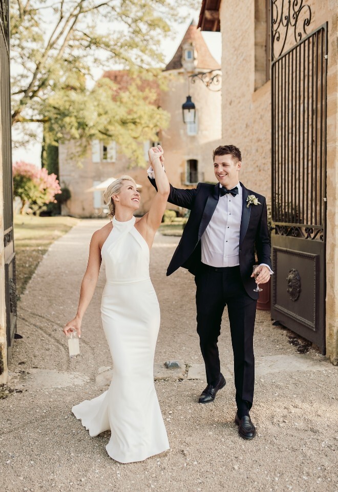 Bride and groom outside a rustic estate, captured by Sam Rundle Photography