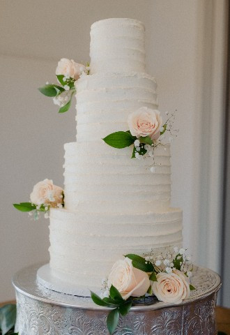 Four tier white cake with light pink fresh roses, Gails Cake Pantry, Powys