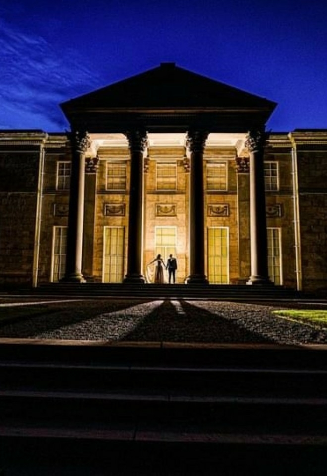Mansion at night Tatton Park Bride and Groom