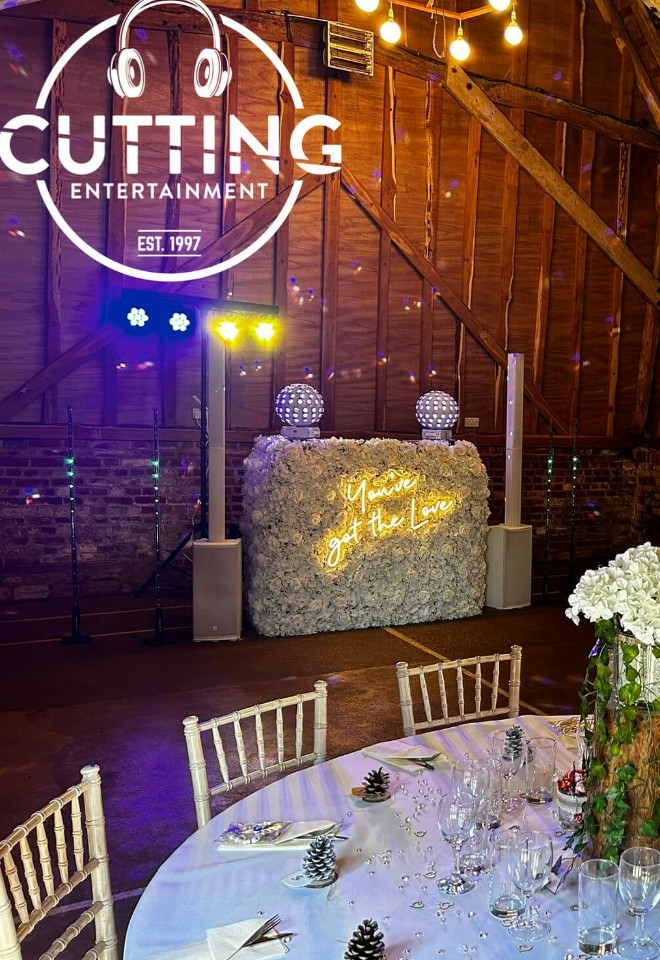 Tithe BaRN FLORAL DJ STAND WITH NEON SIGN AND LOVE LETTERS BARN