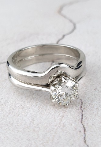 custom wedding ring designed to fit the engagement ring perfectly