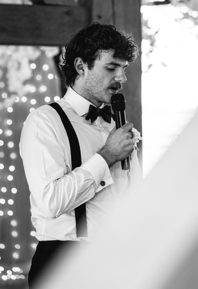 Nicky George hosting and performing magic at a wedding