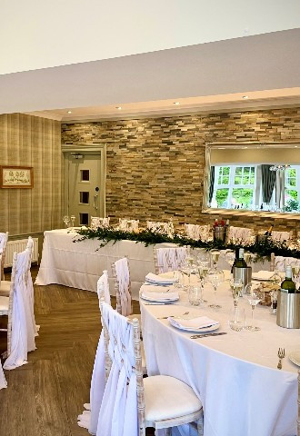 White satin sashes on chivari chairs at Glen Clova Hotel