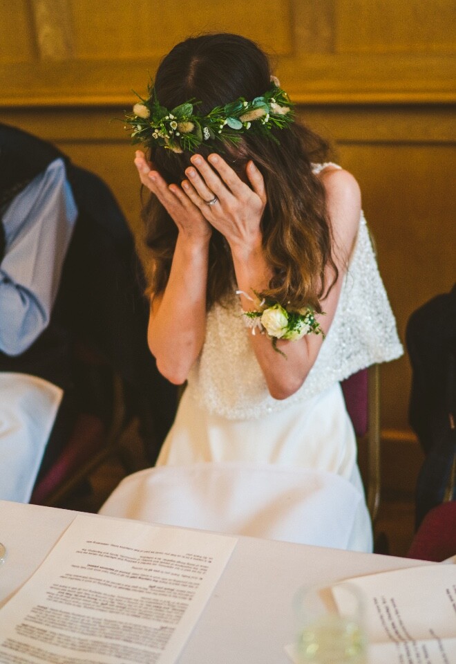 Genuine emotional wedding moment captured naturally in documentary style