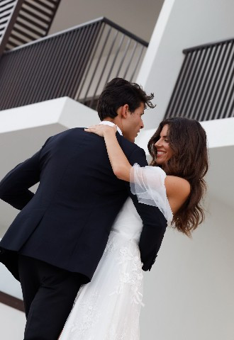 Bride and groom outside Palace Beach Resort Fujairah