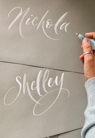 White ink on grey envelopes wedding stationery in Mint Lettering calligraphy Buckinghamshire