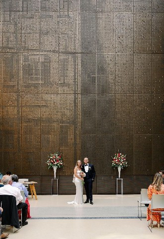 Hackney Town Hall wedding venue aisle bride and groom