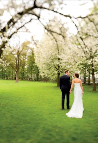 Wedding couple in the gardens of Voco St Johns Solihul, West Midlands
