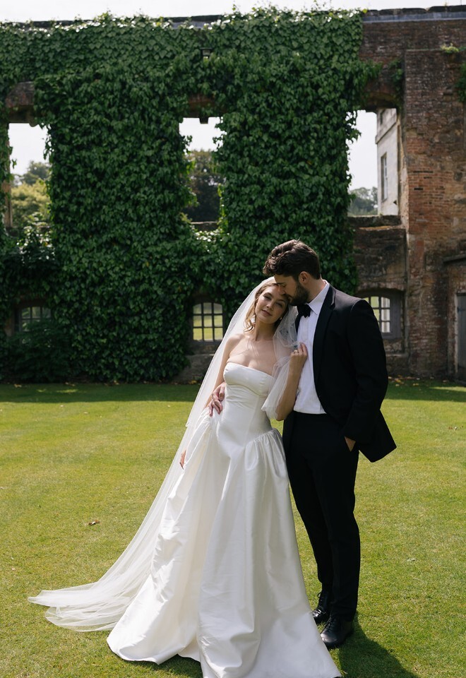 A bride and groom together in the Long Gallery Ruin