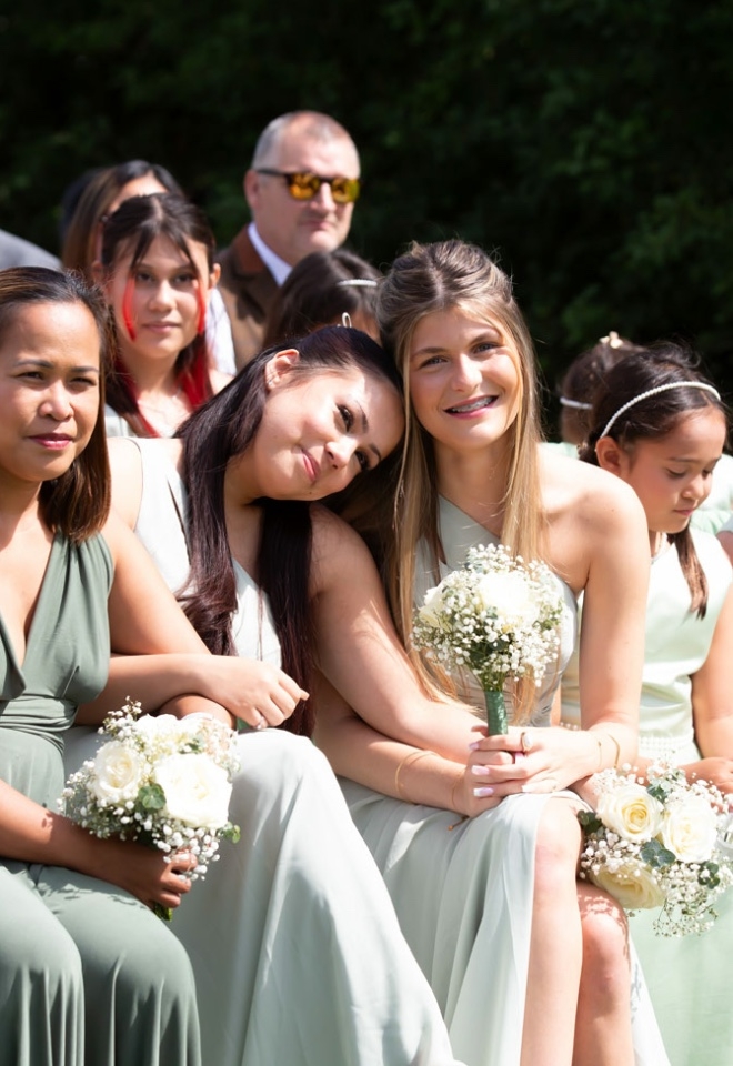 Wedding Photography Buckinghamshire Bridesmaids watching the ceremony 