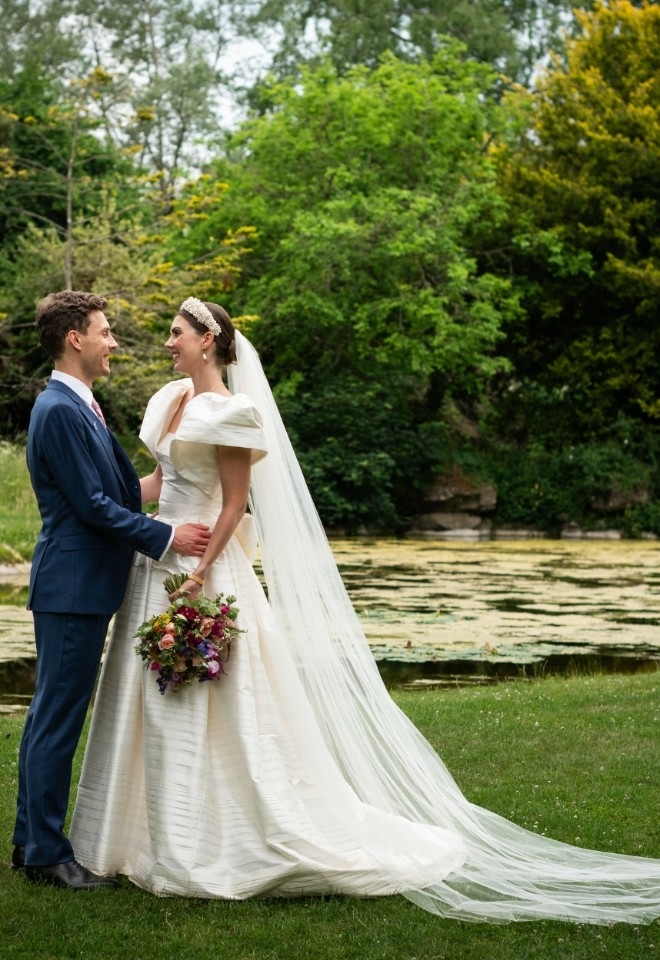 Westonbirt House wedding couple by the lake