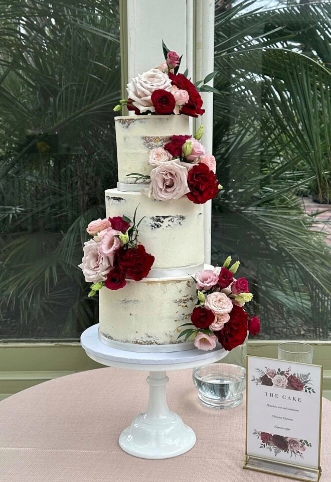 Semi-naked cake with pink & red fresh flowers at Hampton Court House