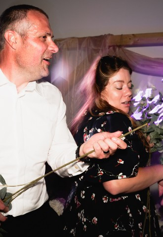 Man and woman dancing at wedding reception
