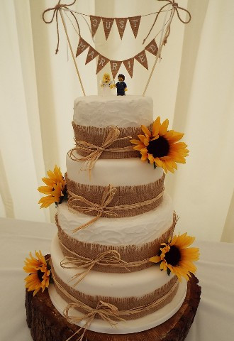 Rustic, Boho style 4 tiered wedding cake with sunflowers from Gails Cake Pantry South Wales
